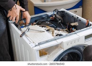 Washer appliance repair in Abilene Texas with open washing machine panel